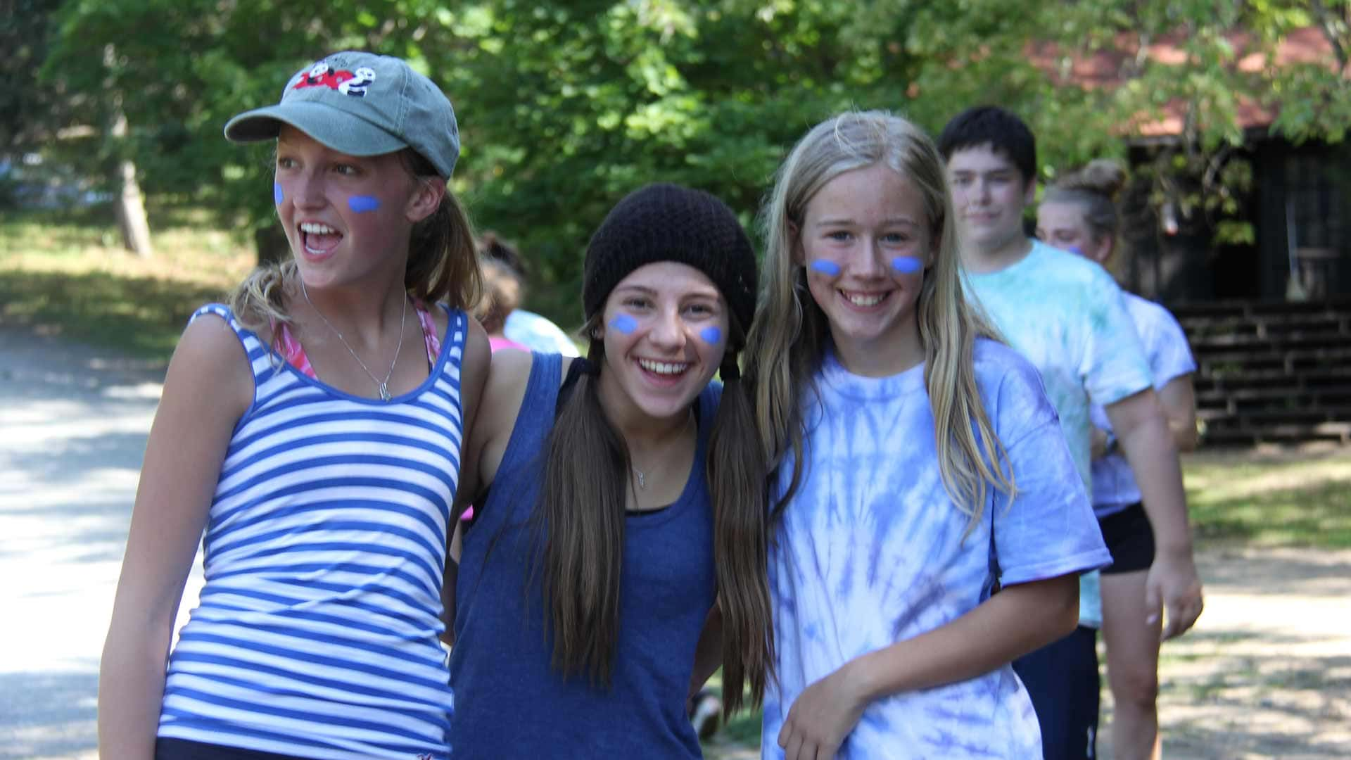 Picture of three students smilling