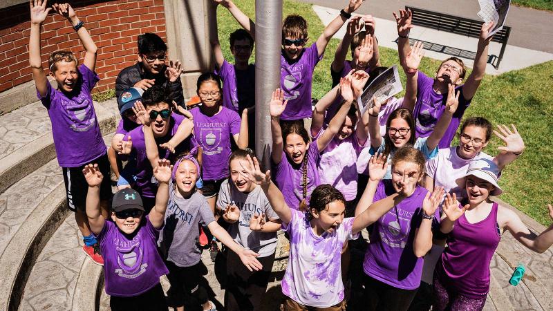 Picture of student in House Potential t-shirts cheering