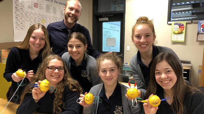 Picture of students holding lemon science experiments