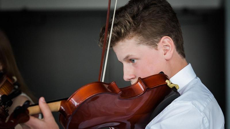 Picture of a student playing the violin