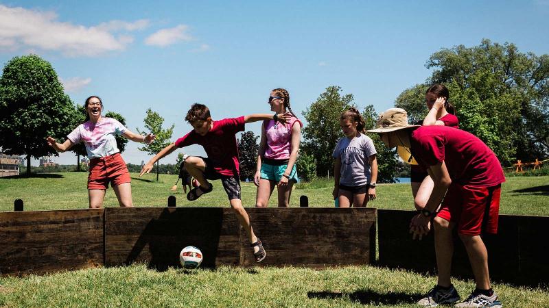 Picture of an outdoor house activity with students