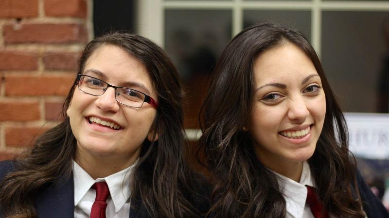 Picture of two students smiling