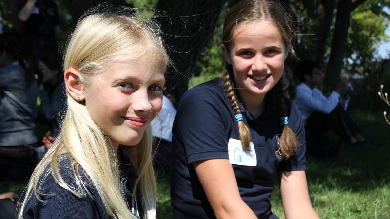 Picture of two students smiling