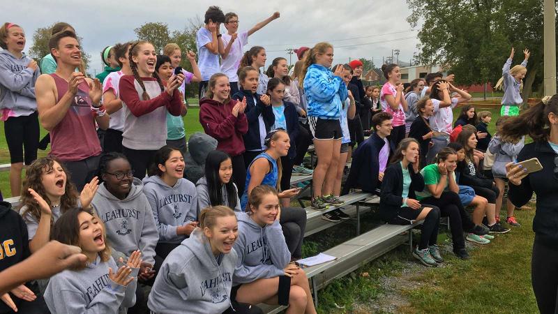 Picture of students cheering outdoors