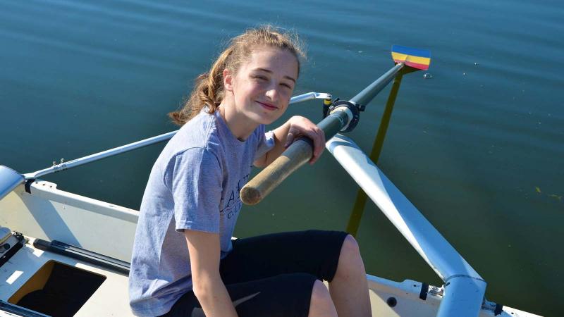 Picture of a student in a row boat