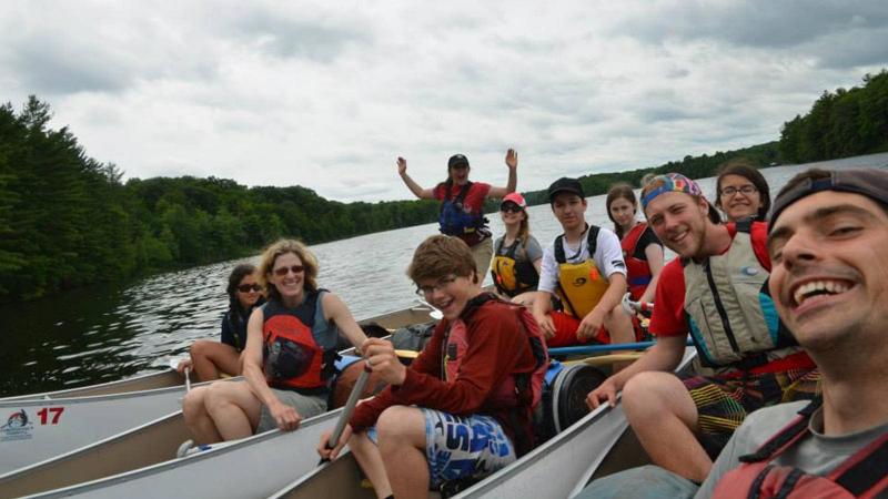 Picture of students on a canoes