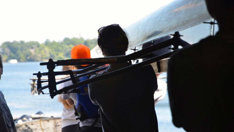 Picture of students carrying a rowing rig