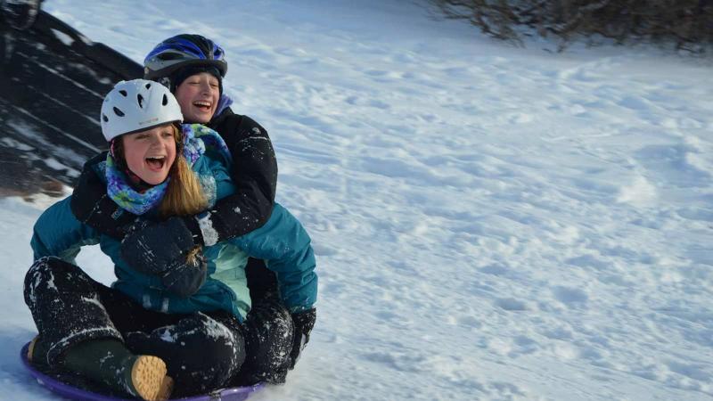 Picture of students sledding