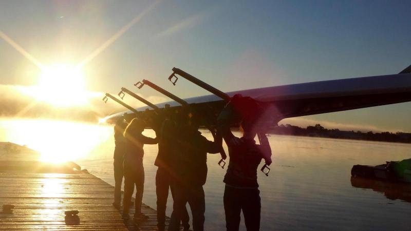 Picture of students carrying a rowing rig