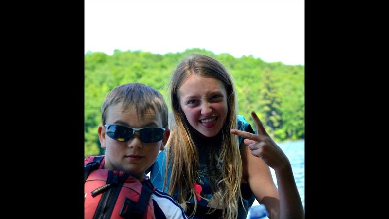 Picture of students in front of a lake